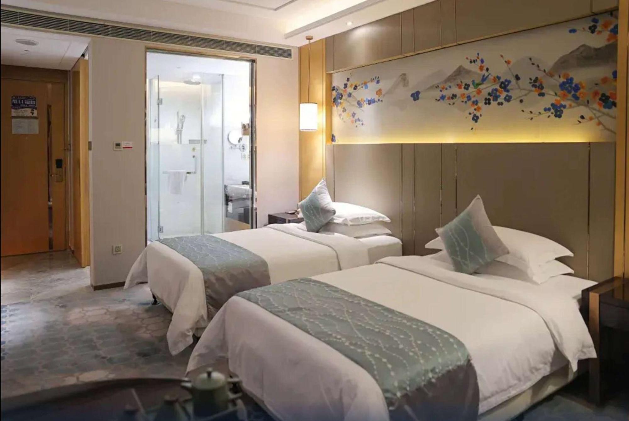Отель Ramada Yiyang Taojiang Экстерьер фото