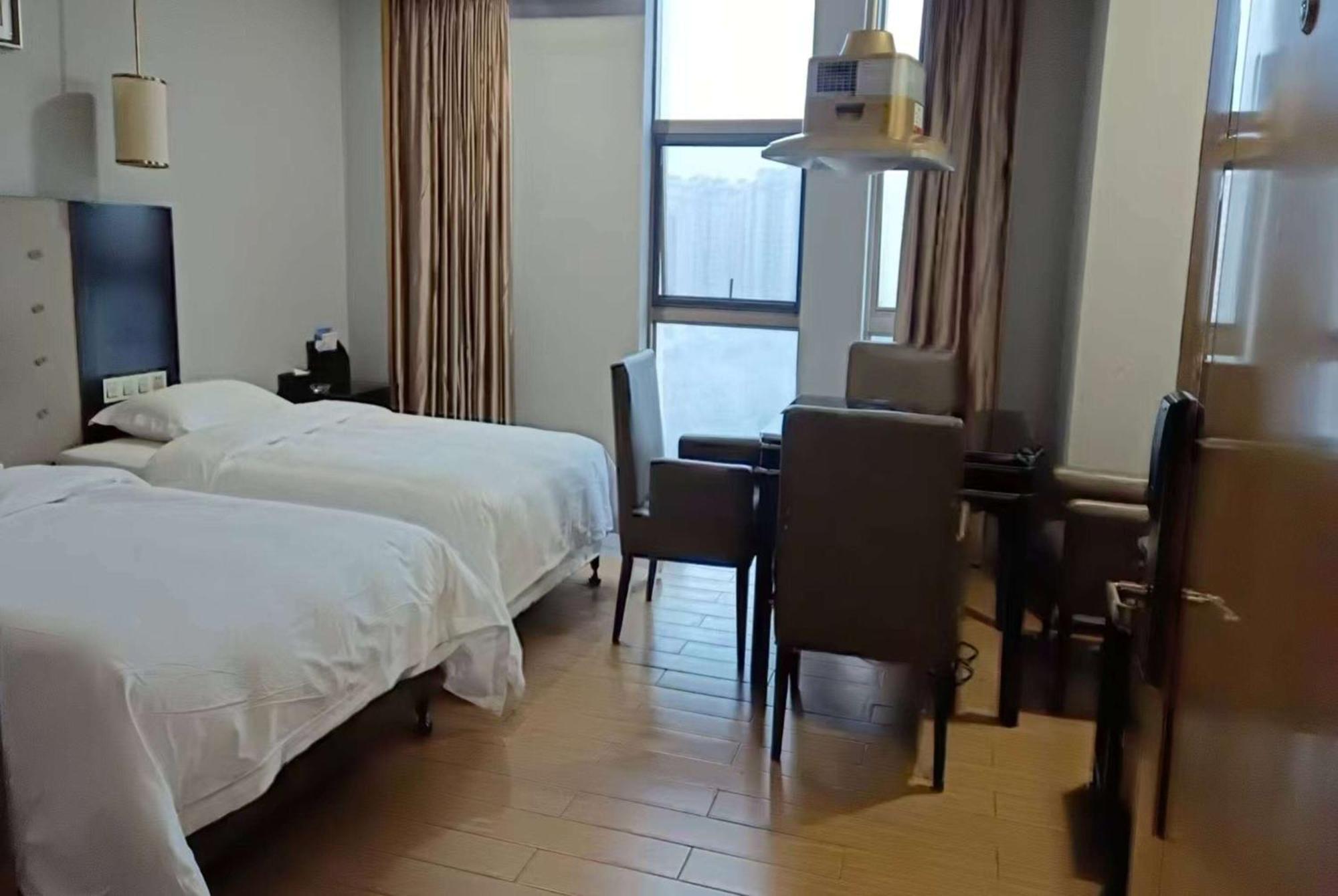 Отель Ramada Yiyang Taojiang Экстерьер фото