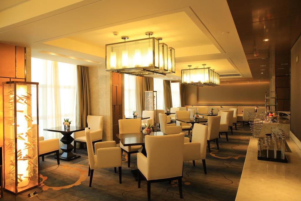 Отель Ramada Yiyang Taojiang Экстерьер фото